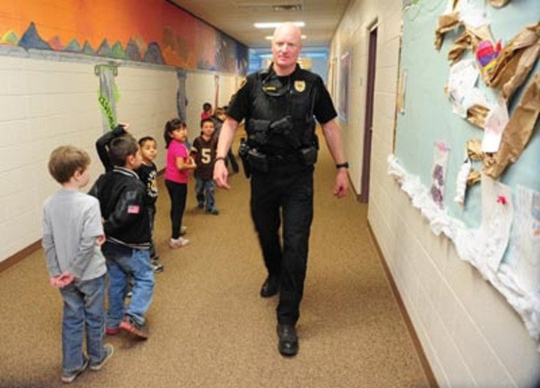 cop in school